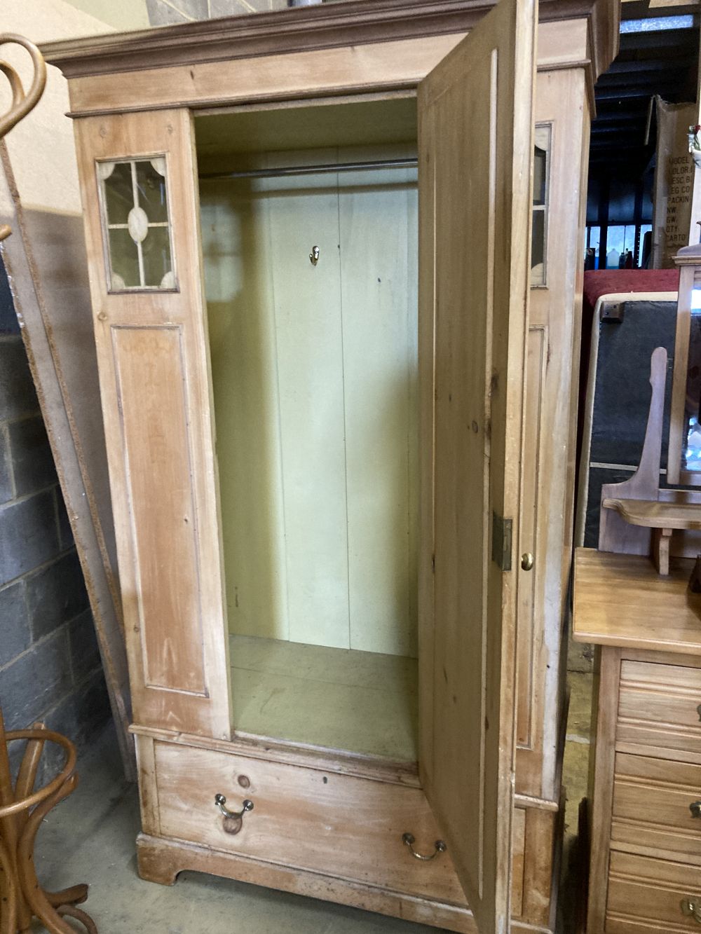 An Edwardian pine mirrored wardrobe, width 110cm, depth 54cm, height 198cm, together with a late Victorian satin walnut dressing chest